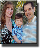 Dr. Mitch Freeman, wife Heather and son Aymen
